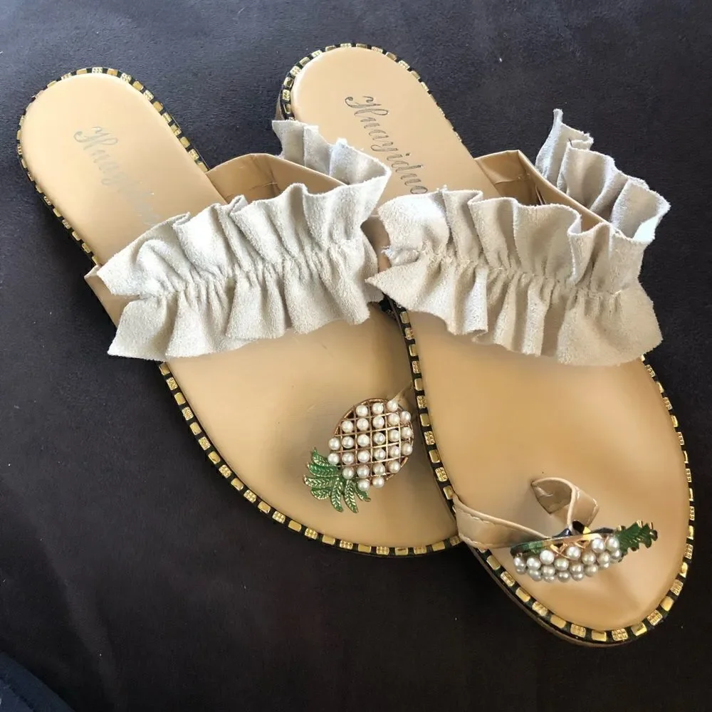 New Never worn pineapple sandals tan in color size 8 runs more like a seven